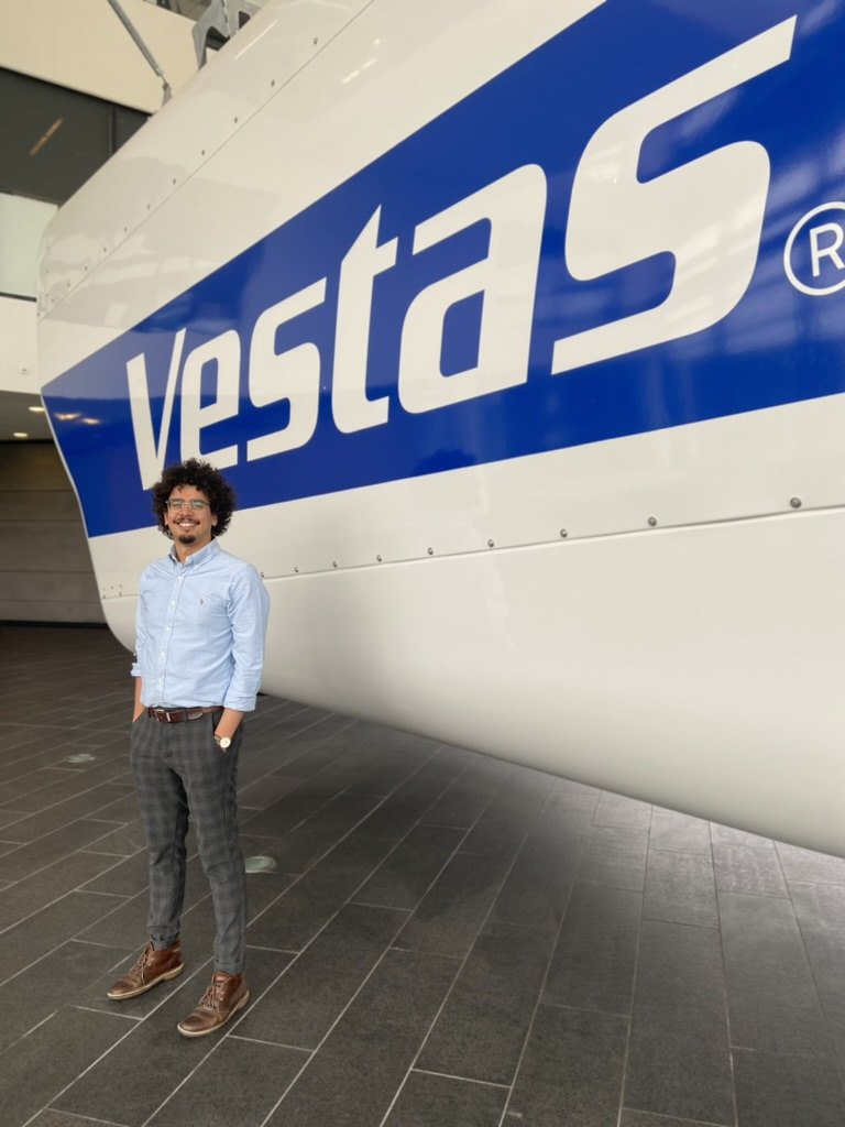 Mohammed Fajar in front of a Vestas nacelle